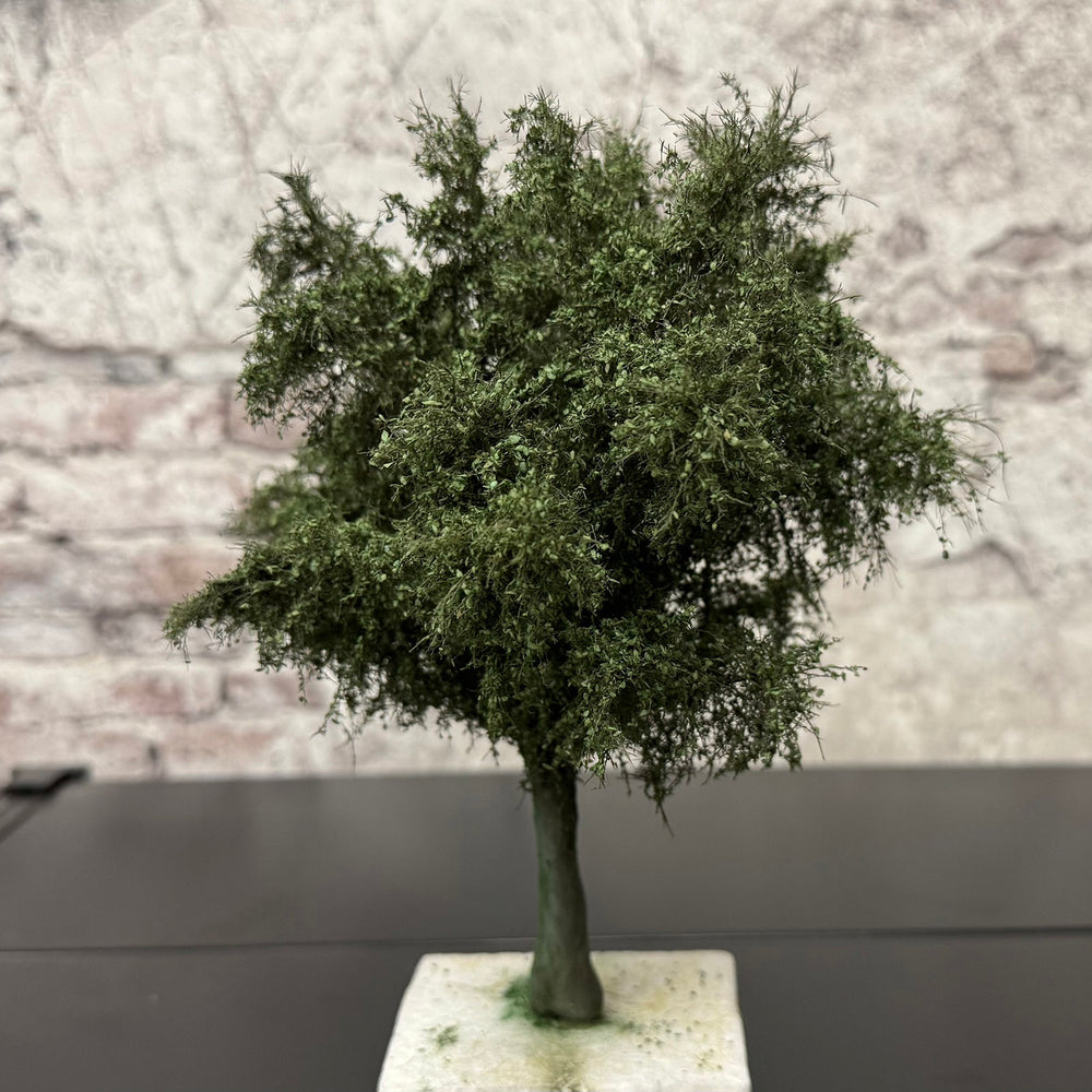 
                      
                        Workshop naald- en loofbomen maken
                      
                    